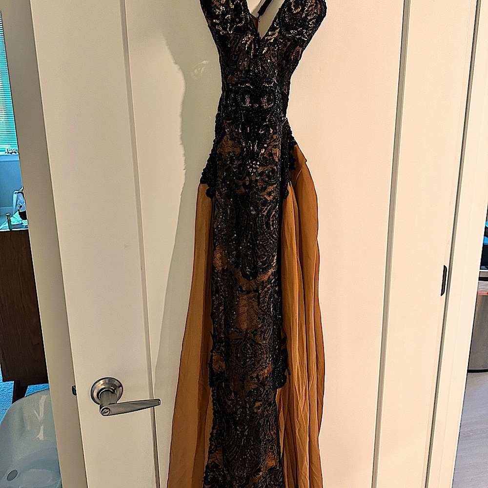 This is a custom made piece. Beautiful ball gown.